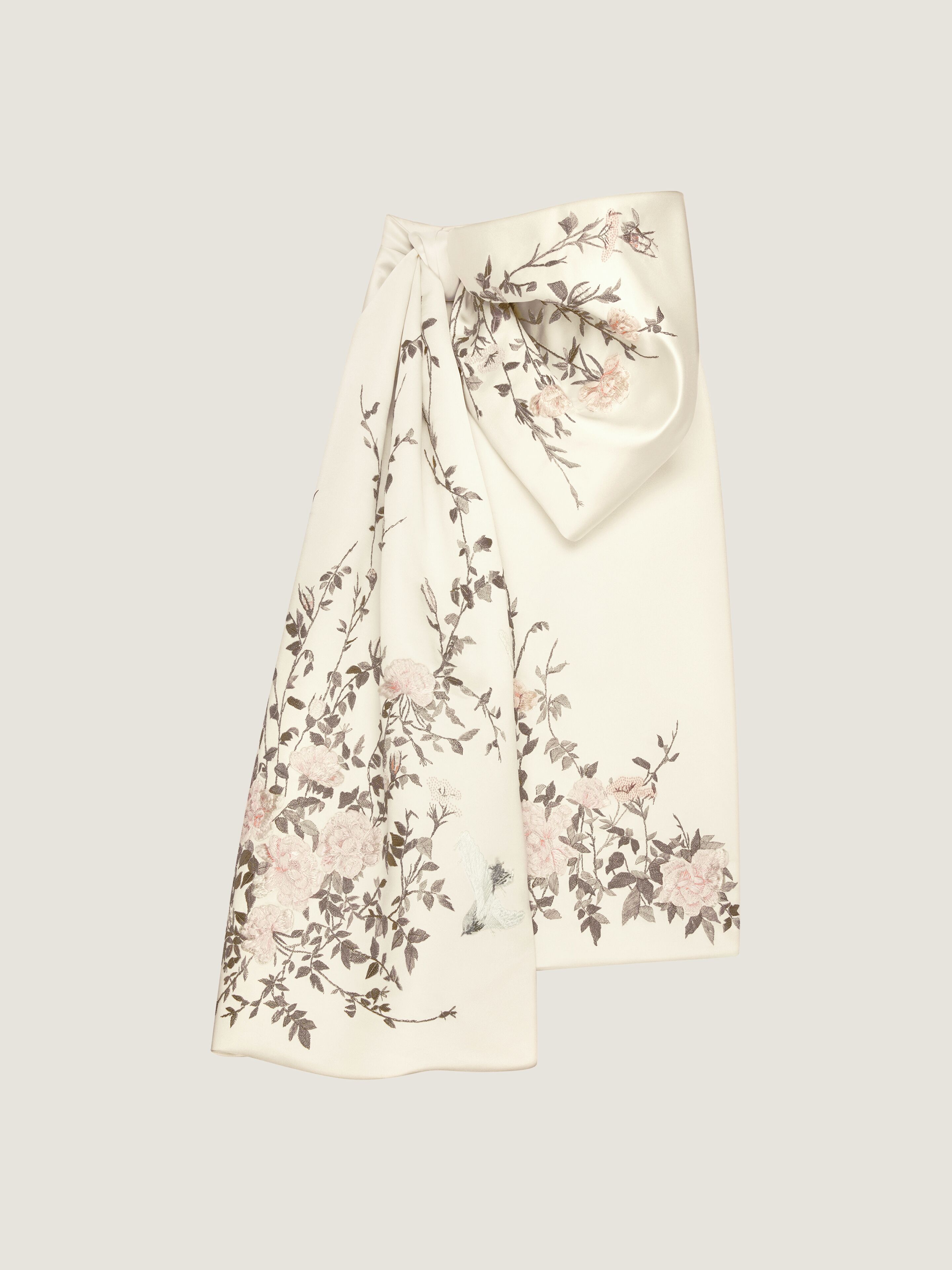 Long skirt in satin with bow and embroideries